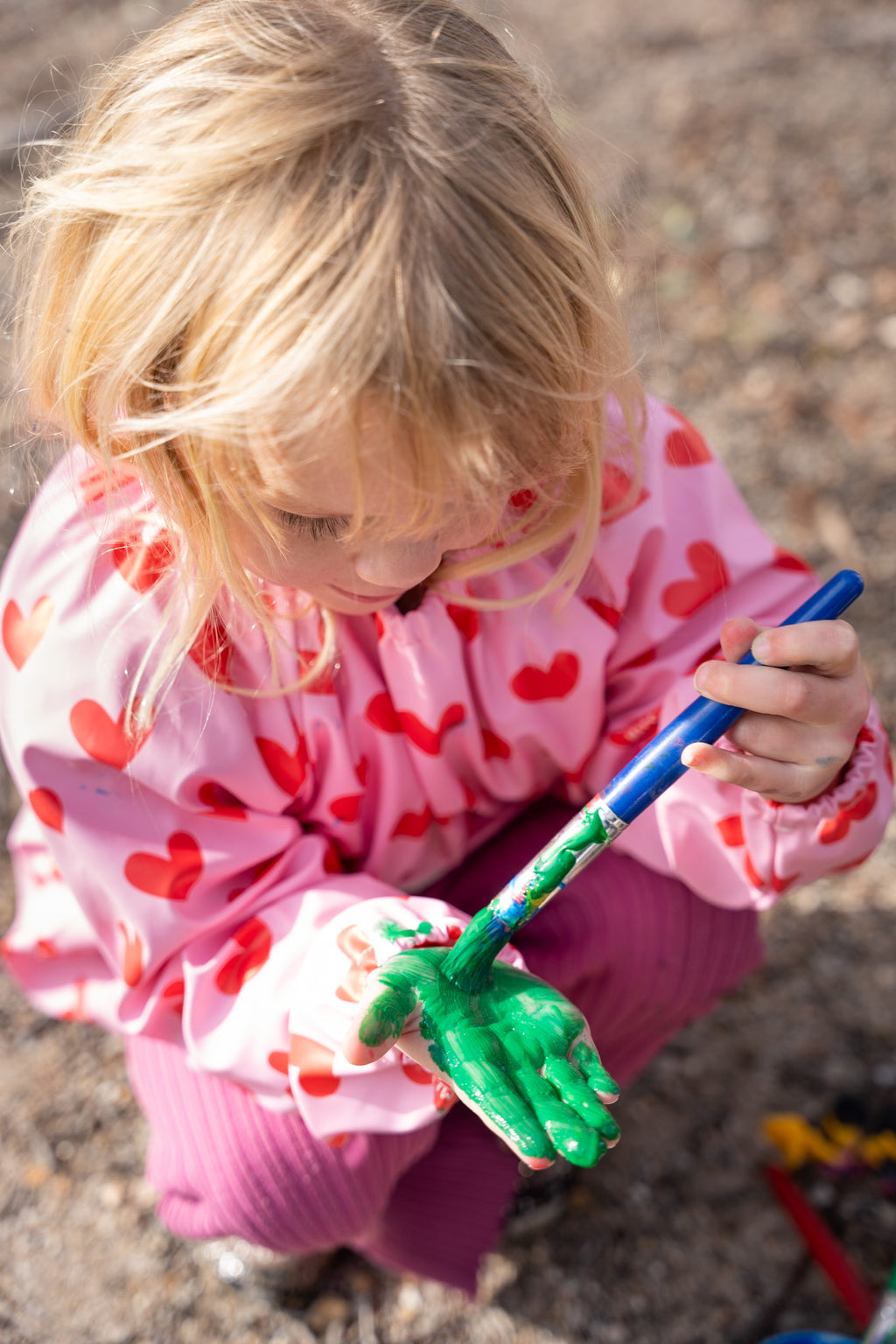 Waterproof Kids Art Smock and Food Bib for toddlers designed for messy play and painting activities