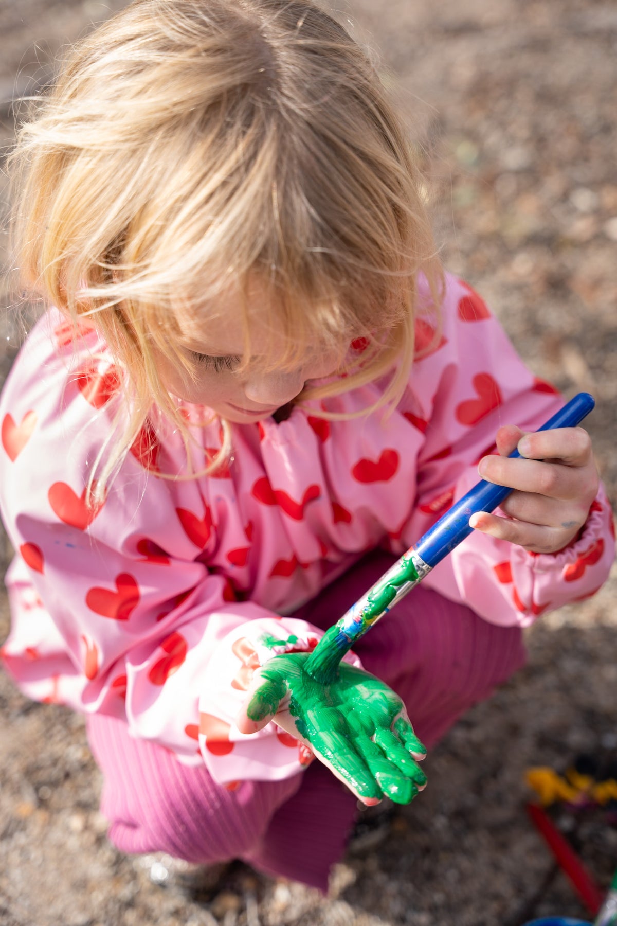 Waterproof Kids Art Smock and Food Bib for toddlers designed for messy play and painting activities